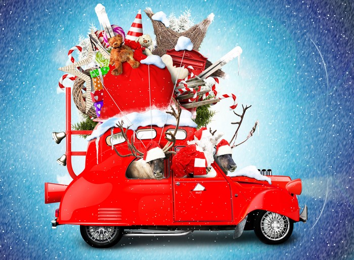 Christmas car loaded with gifts and teddy bear