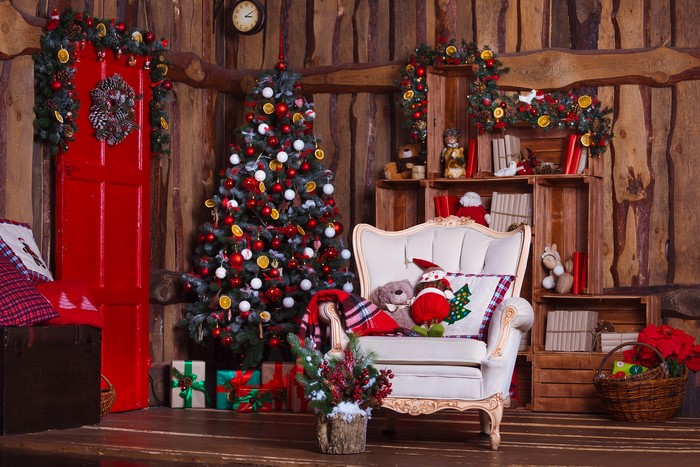 Christmas tree and armchair with gifts