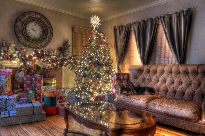 Christmas Living Room with Tree, Gifts, and Sofa