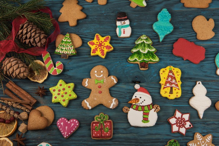 Christmas cookies with pine cones and cinnamon sticks