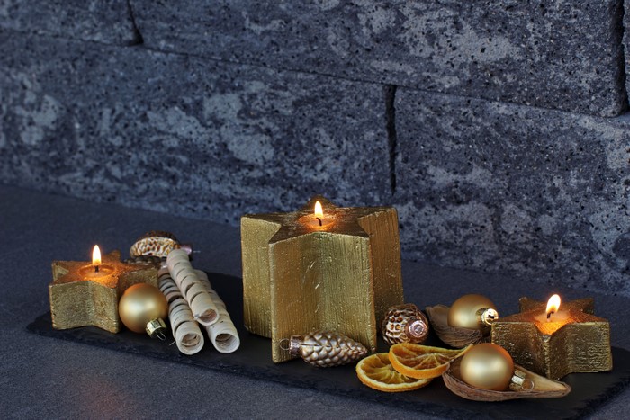 Christmas star candles with ornaments