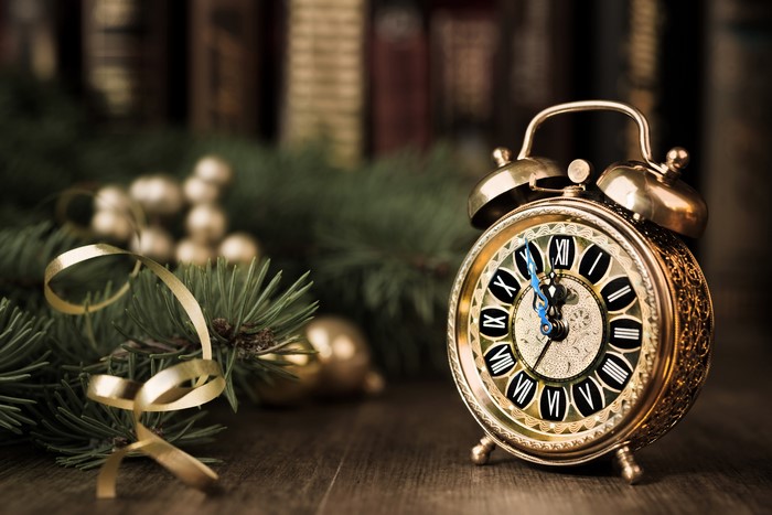 Vintage alarm clock with Christmas decorations