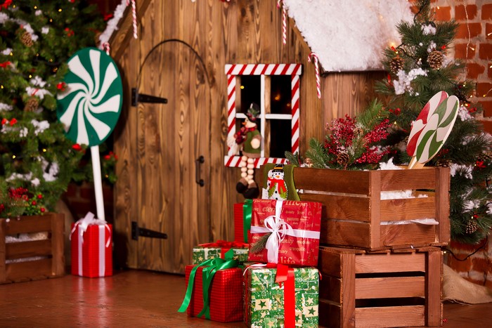 Christmas scene with decorated house and gifts