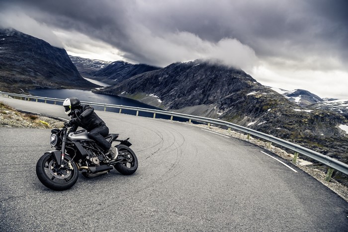 Motorcyclist on 2018 Husqvarna Vitpilen 701 on mountain road