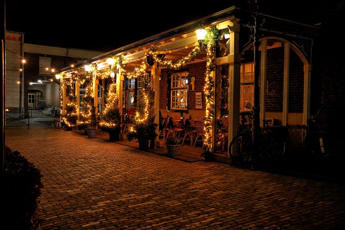 Christmas lights on a building at night in Limburg, Netherlands
