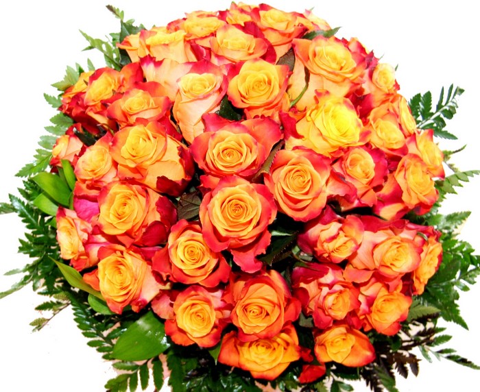 Bouquet of orange and yellow roses with green foliage