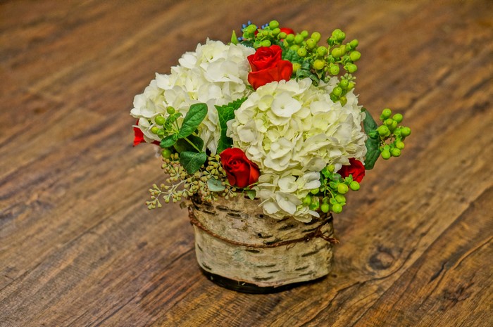 White Hydrangea and Red Rose Floral Arrangement in Birch Vase
