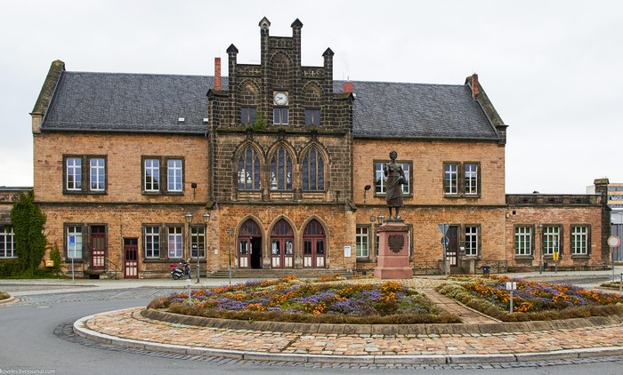 Train station building with a statue in Quedlinburg, Germany