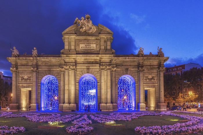 Puerta de Alcala at night with blue lights