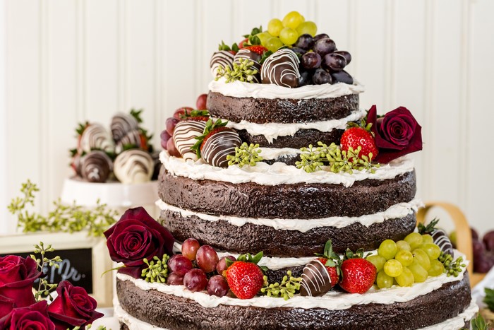 Naked Chocolate Wedding Cake with Fruit and Roses