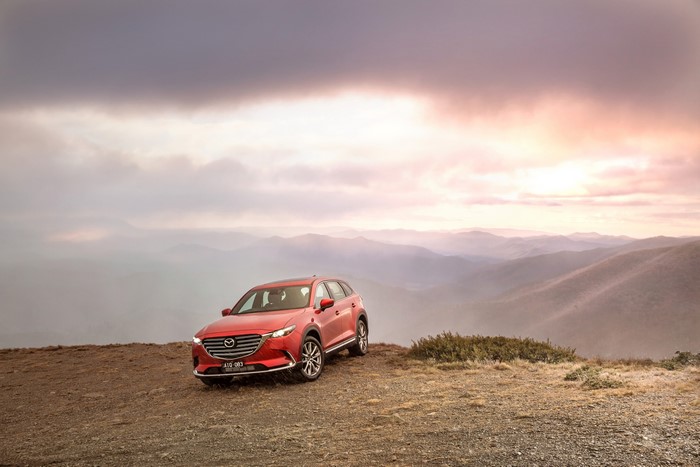 Red 2016 Mazda CX-9 GT on a mountain overlook