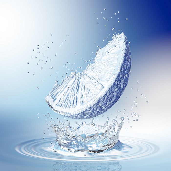 Slice of orange with water splash