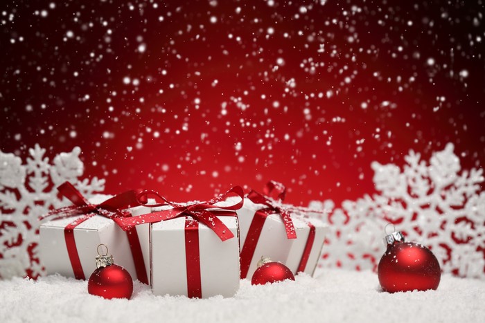 Christmas gifts with red ribbons and ornaments