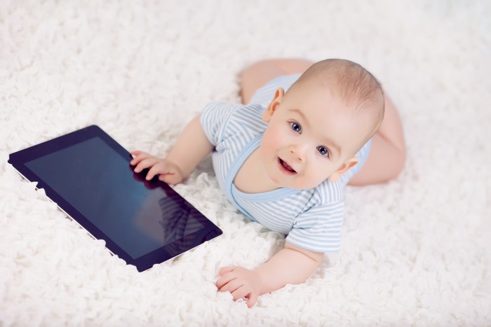 Baby with a tablet computer