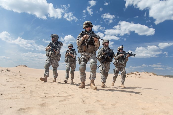 Soldiers in Desert with Assault Rifles