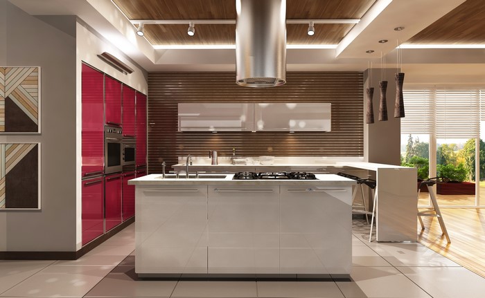 Modern kitchen with red cabinets and island
