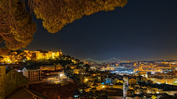Lisbon at Night with Castle and Bridge