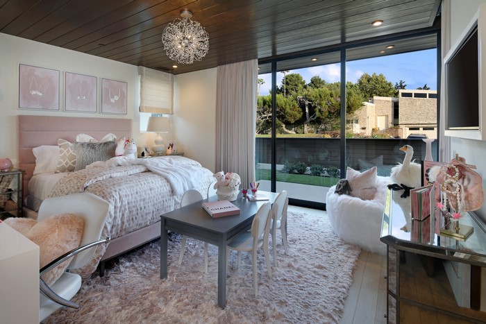 Children's room interior design with bed and chandelier