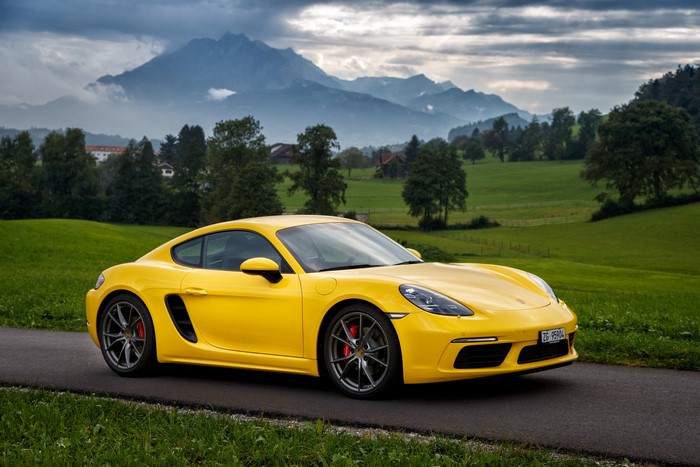 Yellow Porsche 718 Cayman S in Mountains