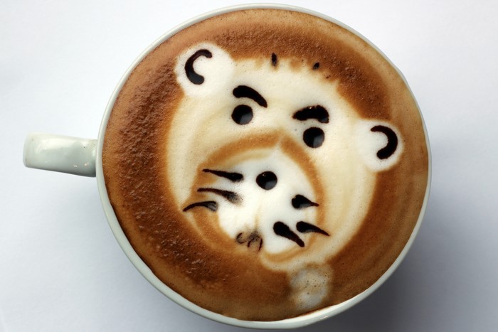 Coffee with a lion face design