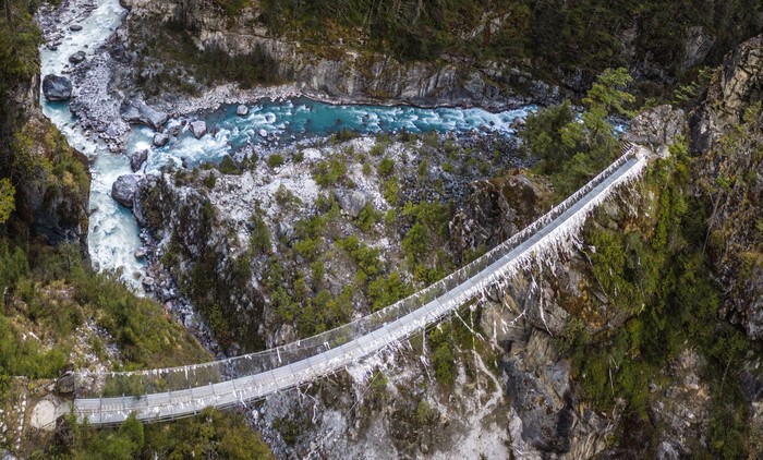 Suspension bridge over a river in Nepal