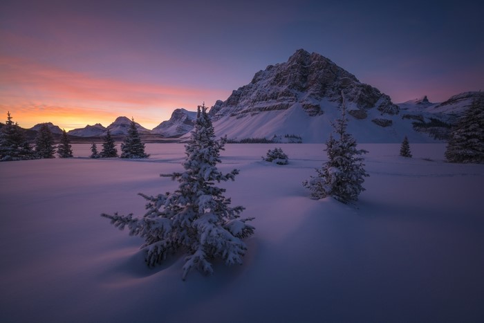Snowy mountain landscape at sunrise in Banff National Park