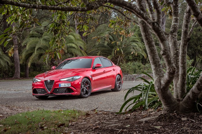 Red Alfa Romeo Giulia Quadrifoglio parked outdoors