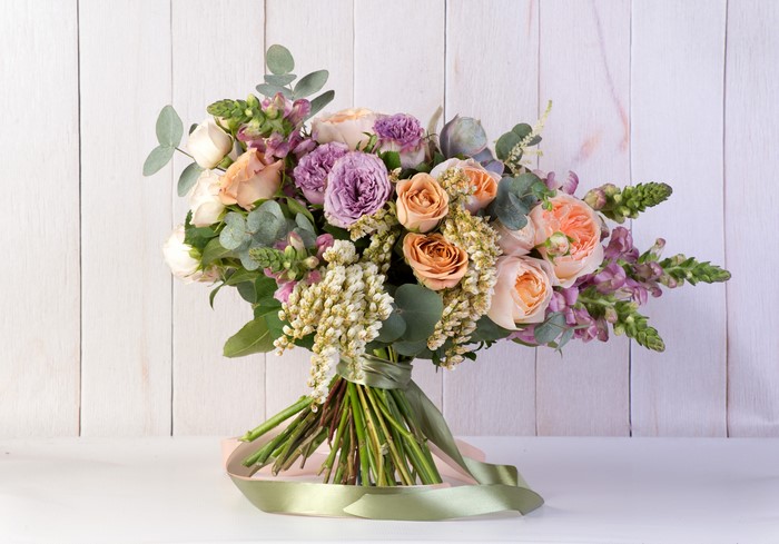 Bouquet of Roses and Antirrhinum on Wood Planks