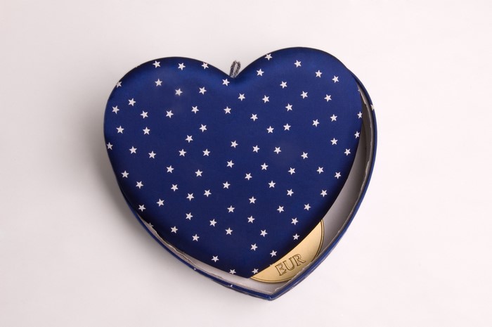 Heart-shaped box with a coin