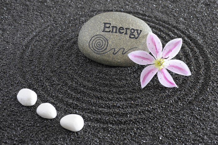 Zen garden with stone inscribed "Energy"