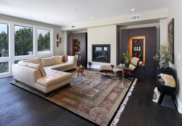 Living room with sectional sofa and fireplace