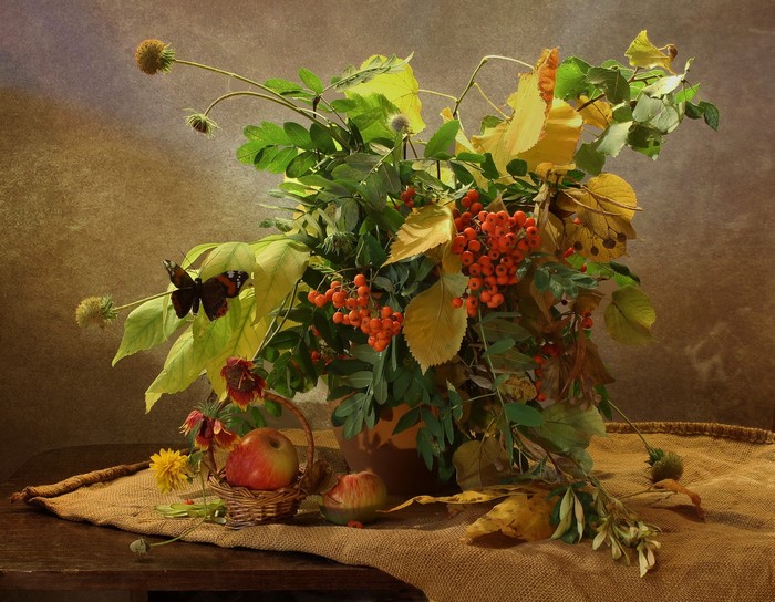 Still-life with apples, rowan berries, and butterfly