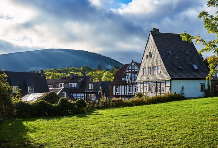 Half-timbered houses in a German village with rolling hills