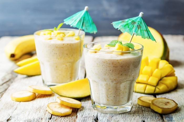 Banana Mango Smoothies with Fruit and Umbrellas