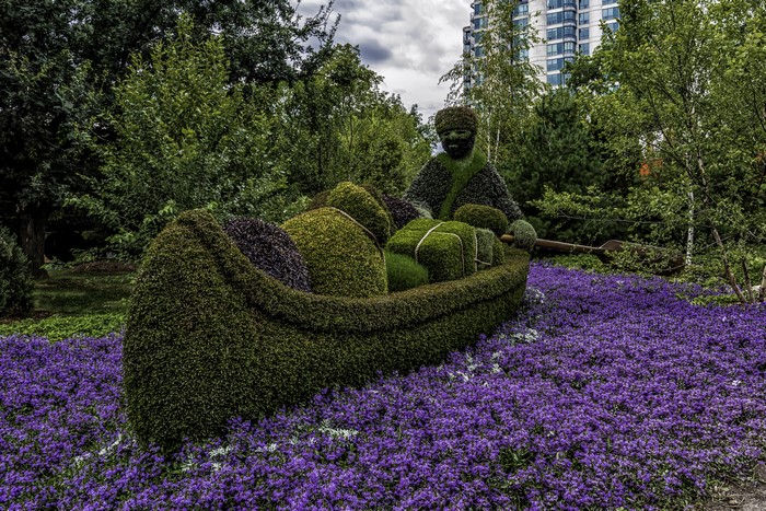 Topiary man in a canoe in Ottawa, Ontario, Canada