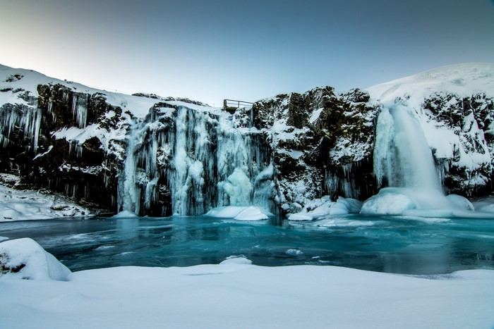 Frozen waterfall in Iceland during winter