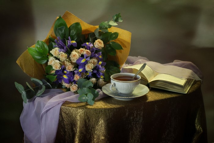 Still-life with bouquet, tea cup, and book