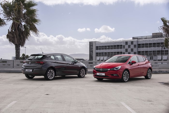 Two Opel Astra cars parked