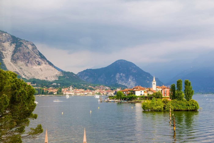 Island village on Lake Maggiore, Italy with mountains