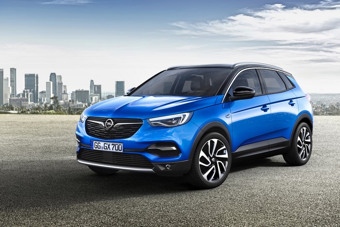 Blue Opel Grandland X with City Skyline