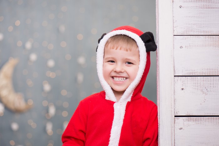 Boy in Santa Costume Smiling
