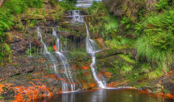 Waterfalls cascading over mossy rocks in Lancashire, England