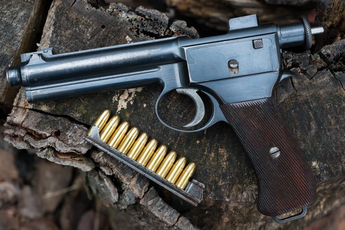Roth-Steyr 1907 pistol with stripper clip of cartridges