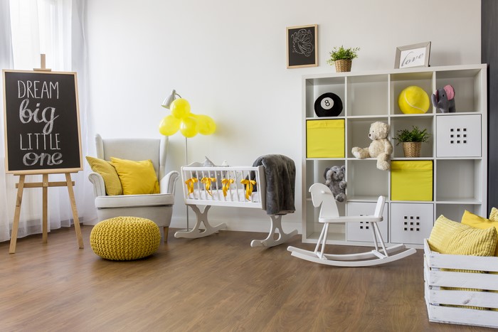 Children's room with armchair and crib