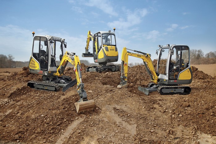 Three Wacker Neuson Excavators on Construction Site