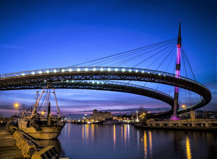Evening View of Pescara's Modern Circular Bridge