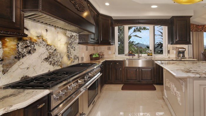 Luxury Kitchen with Dark Wood Cabinets and Granite Countertops
