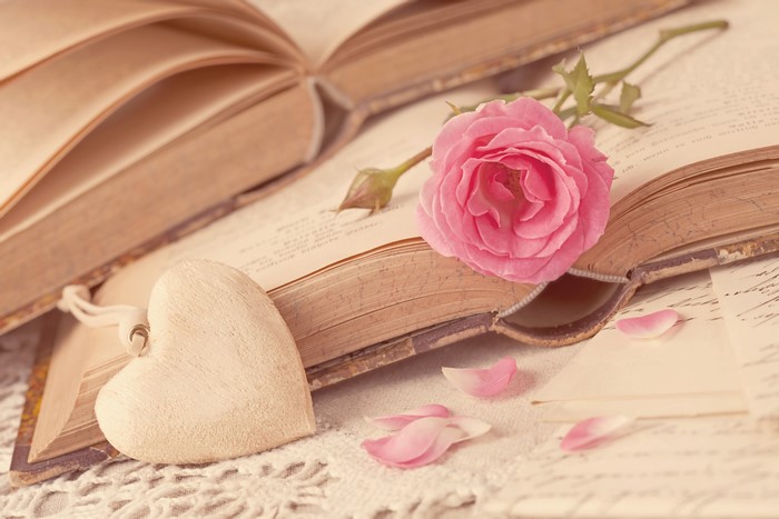 Pink Rose and Heart on Old Books