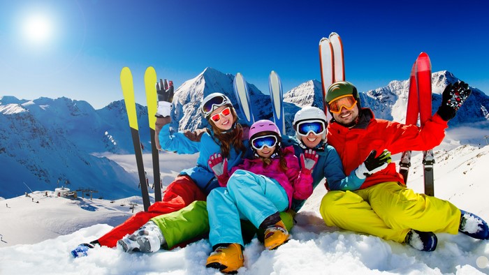 Family skiing in the mountains