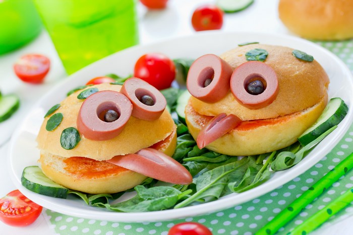 Creative frog-shaped burgers with sausage eyes